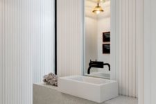 14 White wooden slabs and a stone sink stand create an elegant and modern feel