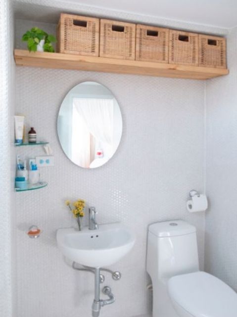 a bathroom shelf with woven basket drawers is a creative and easy idea