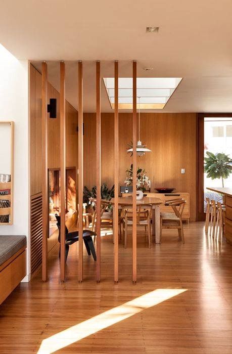 such a slight wood room divider is great to gently hint on the separation of the living and dining rooms
