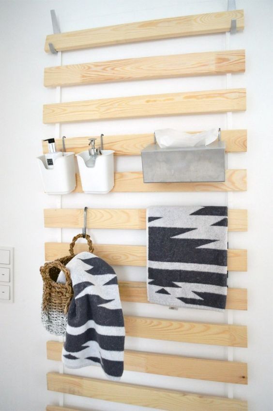a smart IKEA hack to hold various supplies, towels and some baskets and caddies