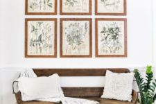 18 a wooden bench, wicker baskets and a gallery wall with botanical art for a natural feel