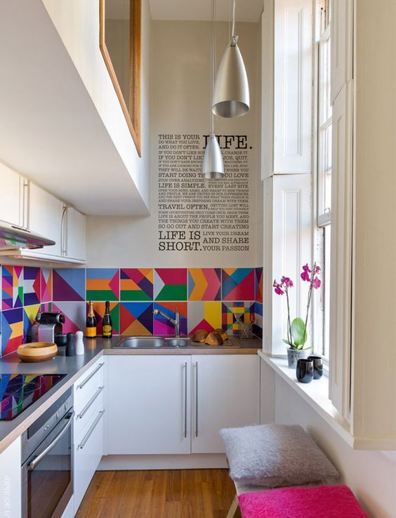 a colorful tile backsplash changes the space and makes it vivacious and welcoming