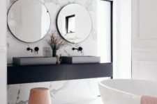 19 a gorgeous marble accent wall and bathtub platform make the space peaceful and refined