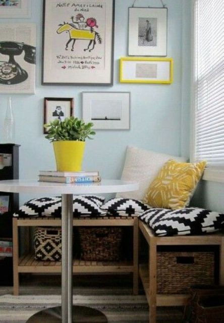 a small corner bench with baskets for storage inside will fit even the tiniest space