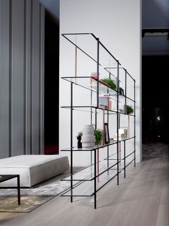a very ethereal shelf of metal and glass doesn't offer much privacy but doesn't look bulky and lets all the lights through