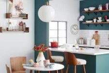 21 a kitchen nook is separated and highlighted in teal color, which makes it bold and cool