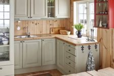 21 rustic vintage off-white cabinets, light-colored wooden countertops and backsplashes for a welcoming feel