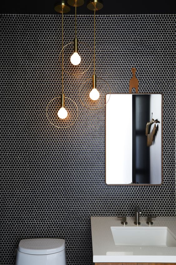 trendy black penny tiles with white grout to stand out plus gorgeous pendant lights
