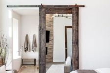 24 a sliding barn door with a mirror is a chic idea, a combo of modern and rustic things for a modern farmhouse