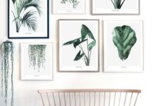 26 an ethereal wooden bench and a gallery wall with mismatched frames and botanical pics for a natural feel