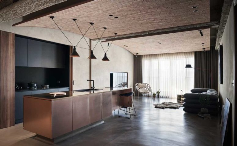 This amazing industrial home features much texture and a lot of natural materials used to create a chic combo