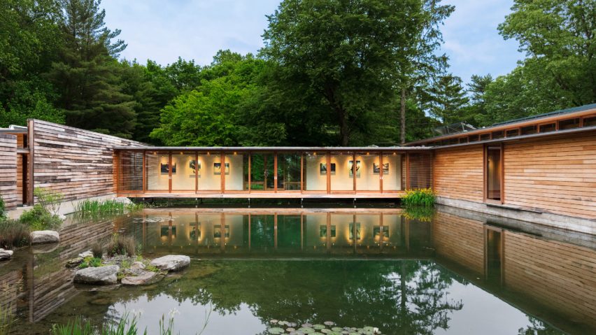 This unique home consisting of three volumes is built with a large pond right in the center to enjoy the wildlife