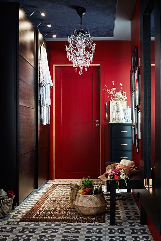 red as the main color for an entryway is great as it leaves a long impression