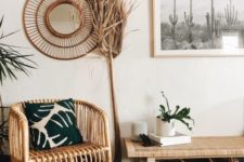 03 a boho desert entryway with rattan furniture, cacti artworks, potted plants and grasses