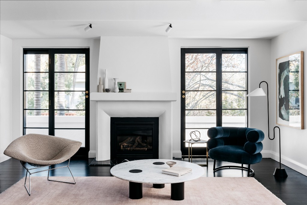 The impeccable taste, with which the furniture was chosen, just strikes, and look at that fireplace, that was newly built   isn't it perfect stylized