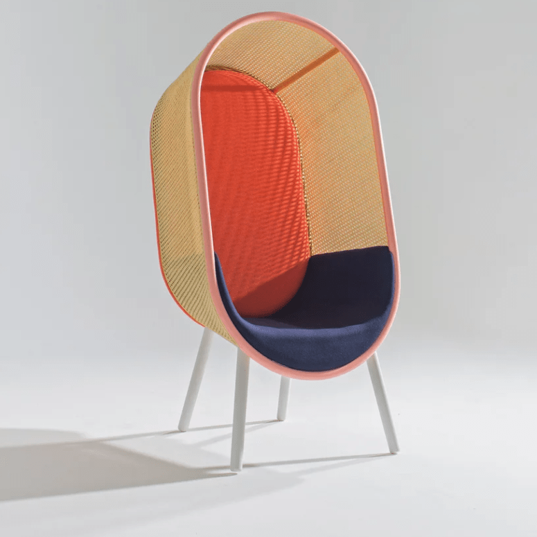 The red version features painted rattan and a navy seat and looks more mid-century like