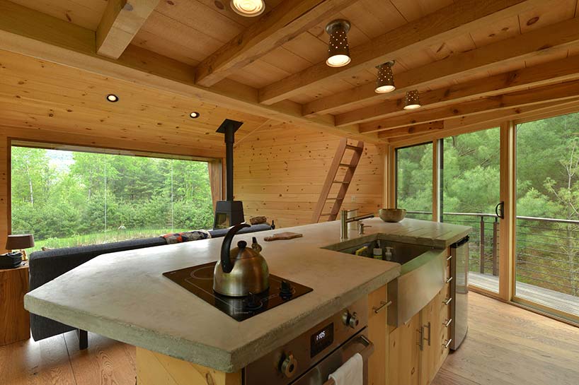 The kitchen island contains everything necessary for cooking, though not much storage space