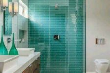 05 a contemporary bathroom with a turquoise tile statement wall in the shower for a wow effect