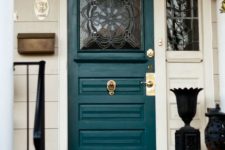 06 a stylish teal front door with a glass insert and gold detailing looks wow
