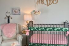 07 a very colorful space with pink and palm leaf print textiles and all neutrals for a little girl
