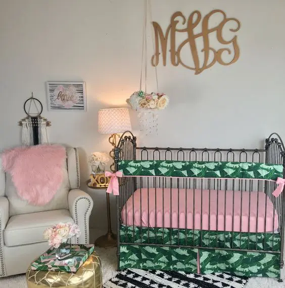 a very colorful space with pink and palm leaf print textiles and all neutrals for a little girl