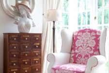 09 a chic vintage chair is made more modern with a pink printed seat and back and white armrests