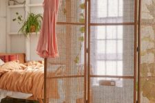 09 an elegant rattan and wood lettice screen is great to separate some space of your home without a bulky look