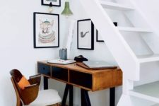 09 make your staircase as airy as you can to let some light inside and add hanging lamps over the working space