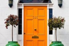 09 paint the door orange and add a couple of bright green pots to personalize the entrance