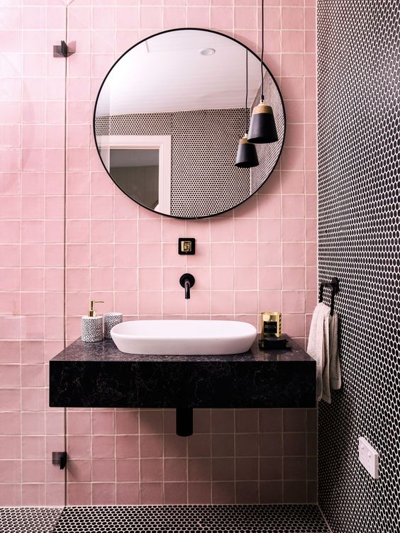 pink and black penny tiles create a bold and chic combo for a modenr bathroom