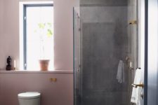 11 the contrast between pink walls and grey concrete is striking and the space doesn’t look too glam and girlish