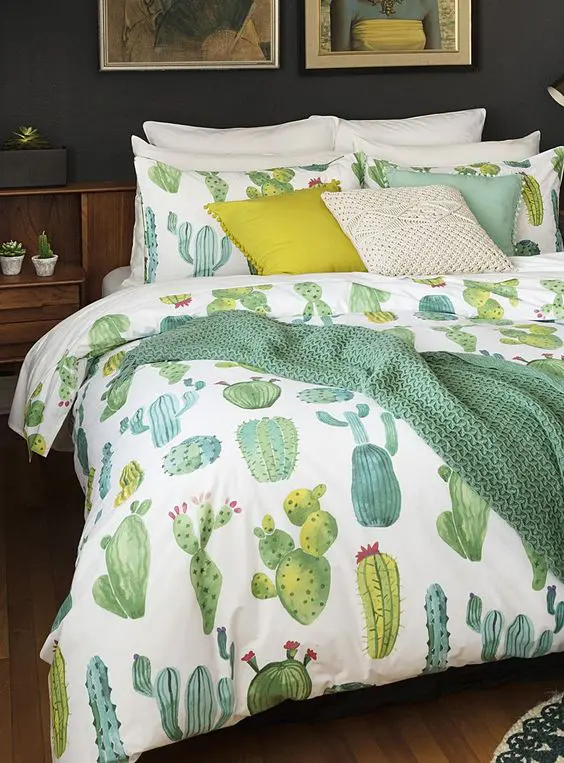 Cactus print bedding with mustard touches and a matching pillow will make your bedroom more boho like
