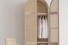 13 a chic dresser with wood lattice doors brings a coastal feel to the space and looks very airy