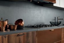 13 stained wood, copper and white kitchen cabinets calmed down with a grey concrete backsplash and countertops