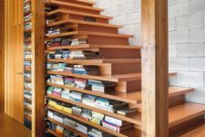 14 a modern take on a traditional staircase with two-sided steps and lots of book stored there