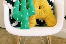 15 a bold green cactus pillow is a simple way to spruce up the space and you can DIY it