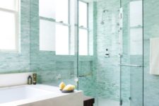 16 gorgeous turquoise little tiles in the lighter and bolder shades to create a watercolor feel in the bathroom