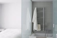 17 a frosted glass space divider is a great idea as it brings privacy yet doesn’t separate too much