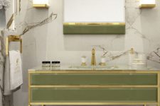 19 a chic light green vanity and mirror with brass touches are ideal for a luxurious space