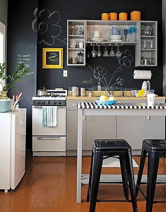 A whole chalkboard wall inspires creativity and chalking on it   both kids and adults will have fun