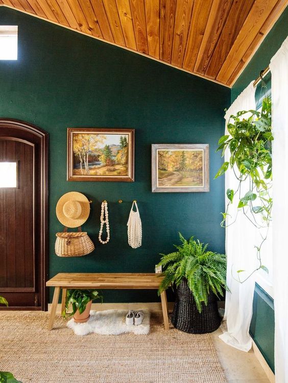 rock green shades and real greenery for an entryway to make it welcoming and embracing