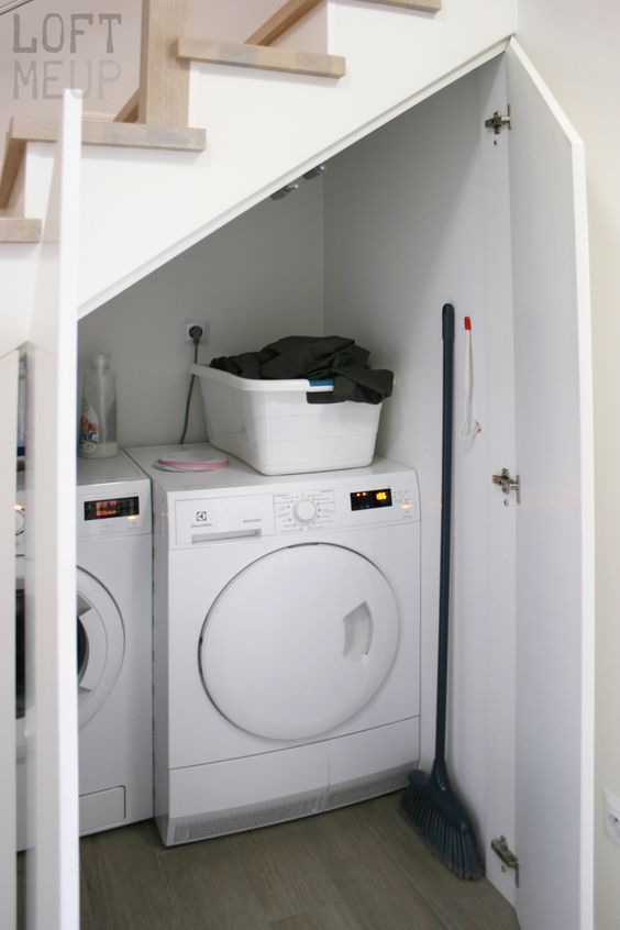 place a laundry under the stairs, there's enough storage space even for chemicals