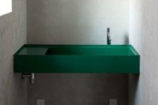 22 a small industrial powder room is spruced up with a minimalist emerald sink built-in between the walls