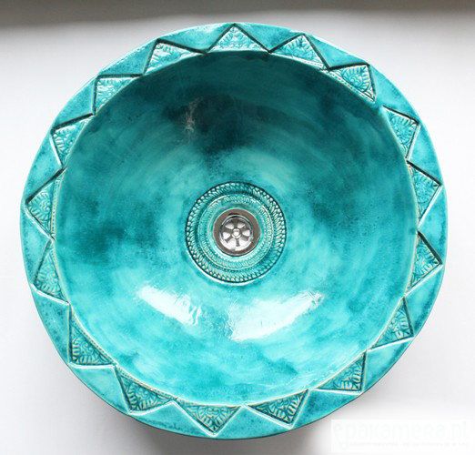 a gorgeous Moroccan turquoise sink with textural patterns is a fantastic way to make a statement