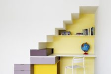 23 colorful storage pieces attached to the walls serve as a staircase at the same time
