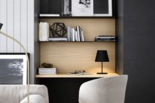 25 a small yet comfy contemporary home office nook with floating shelves and a desk in the corner of the room