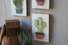 25 an arrangement of string artworks with cacti, string art pieces are extremely popular