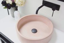 26 an elegant and refined round blush sink plus black touches for a stylish modenr bathroom