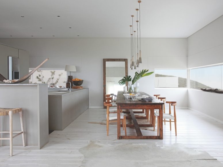 concrete kitchen island to add a masculine touch to the interior