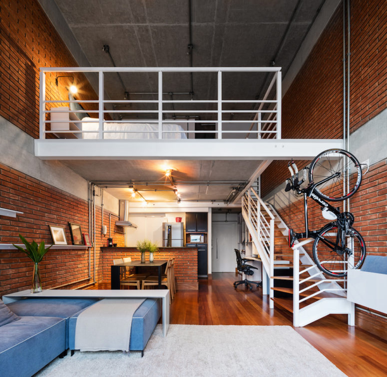 This industrial loft is a rented home, so when the designers were about to renovate it, they couldn't change the backdrop   walls, ceilings, floors
